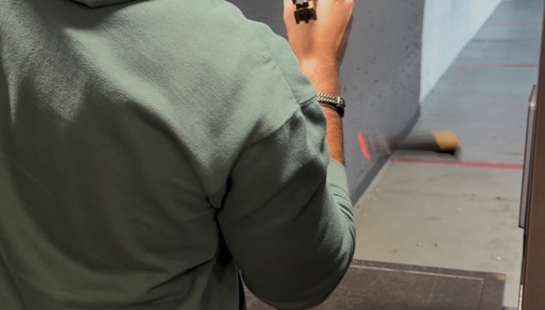 Shooter at Franktown Firearms indoor range lane Shooter at Franktown Firearms indoor range lane